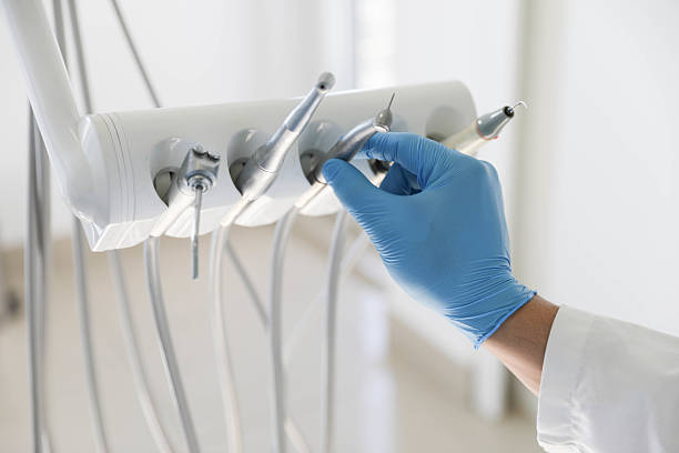 Professional Root Canal Treatment technician working in Machesney Park, IL